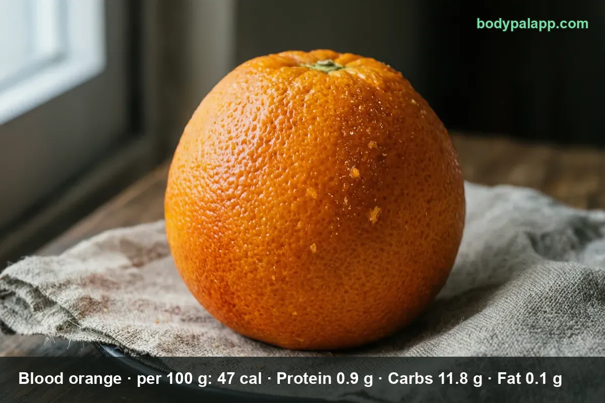 Whole blood orange with entirely orange peel, uncut, no red blush